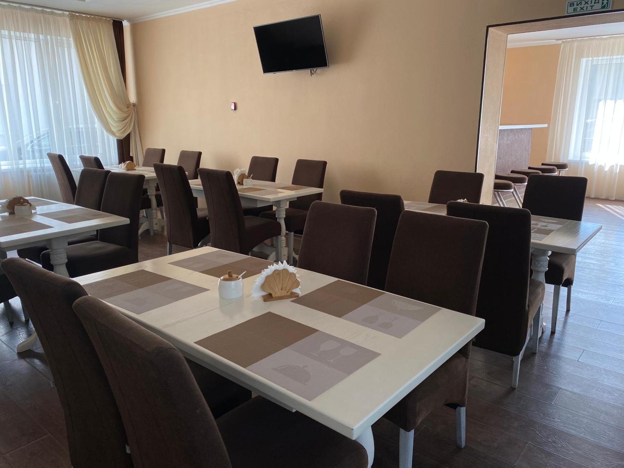 Орхідея Hotel Romni Kültér fotó