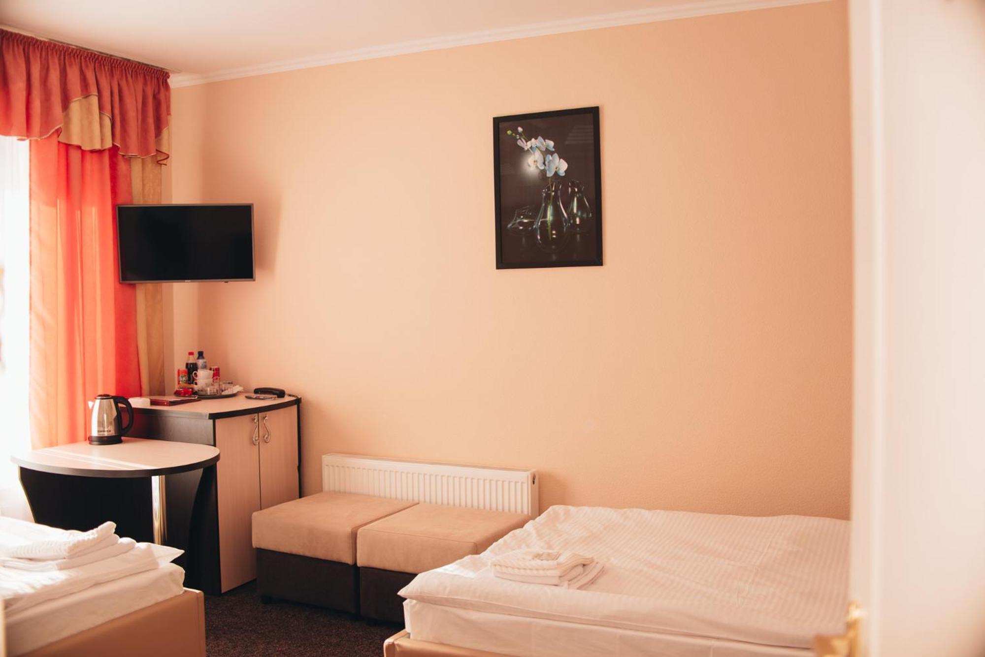 Орхідея Hotel Romni Kültér fotó