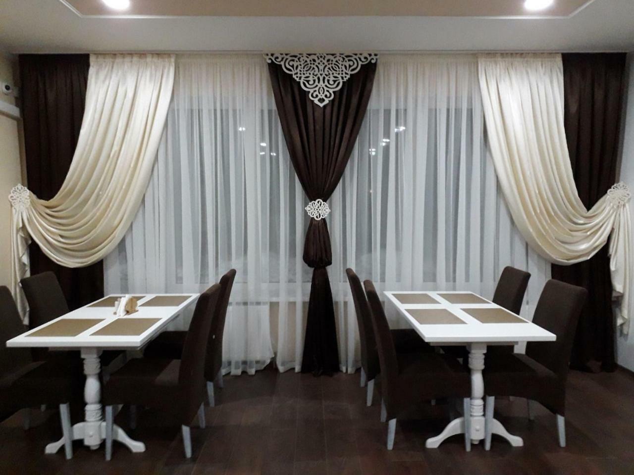 Орхідея Hotel Romni Kültér fotó